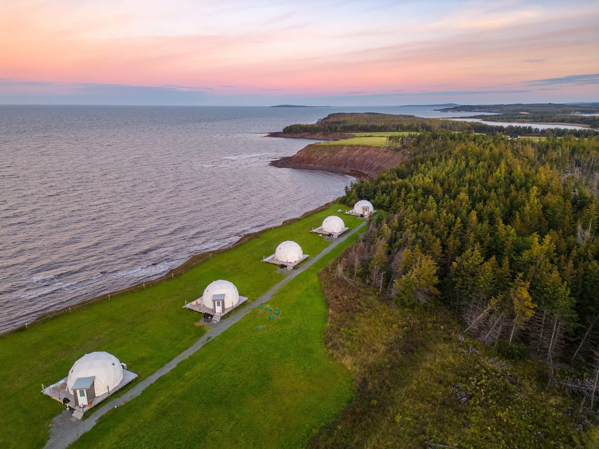 Glamping domes at sunset